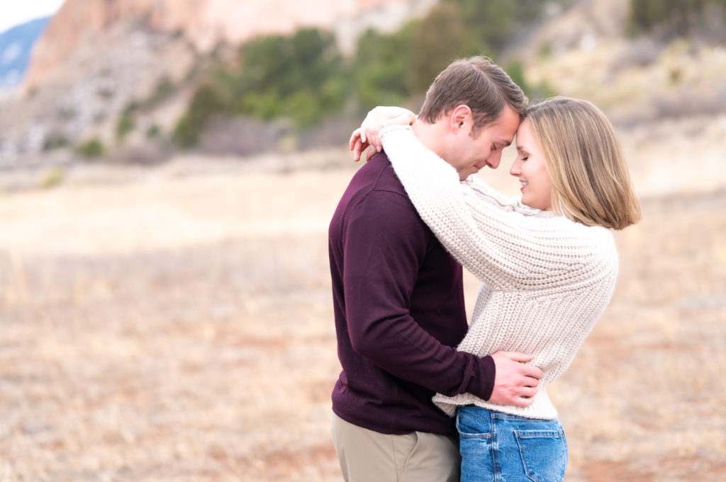 Couples adventurous session at Garden of the Gods Park