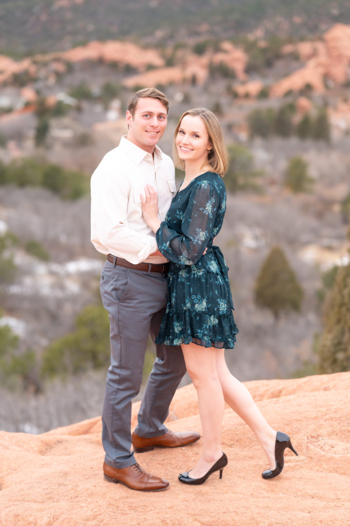 Couple portrait photo at mountain overlook at high point overlook within garden of the gods at Colorado Springs 