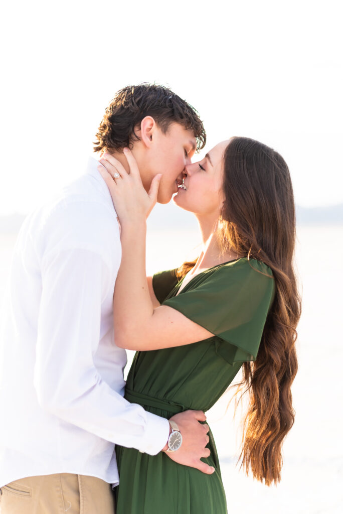 Couple intimate kiss during Colorado engagement photoshoot 