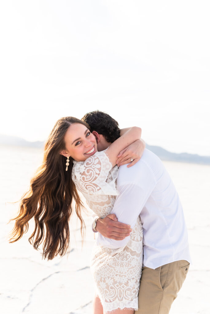 Groom hugging his bride intimately during Colorado Springs engagement photoshoot 
