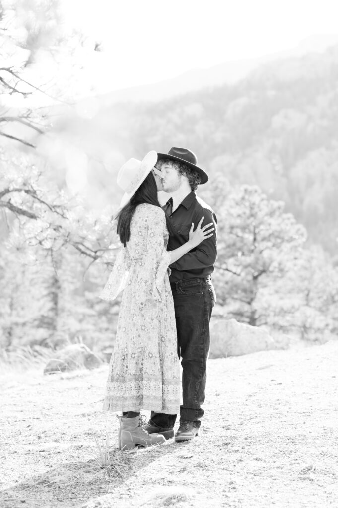 Couple kissing in the mountains