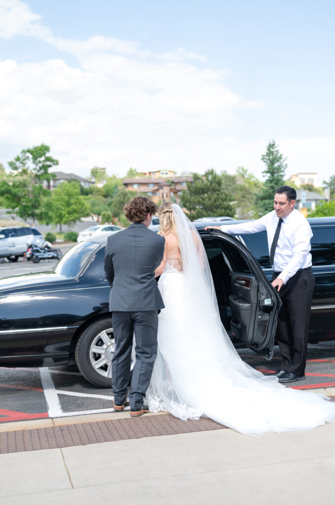 photo of the bride and groom getting into their limo on their wedding day