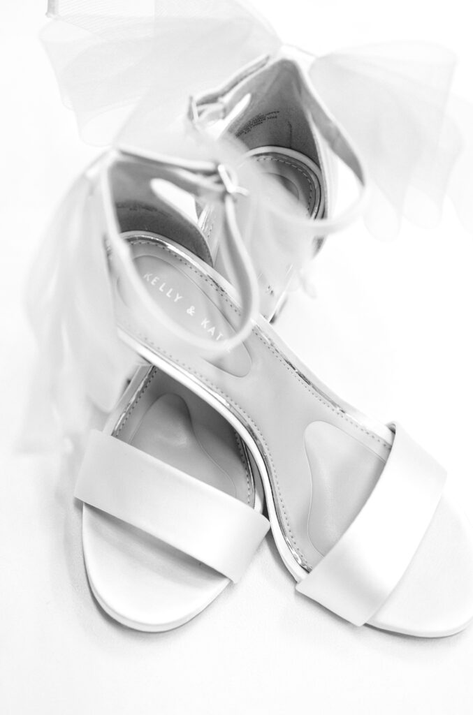 black and white detail photo of the bride's wedding heels on her Colorado wedding day