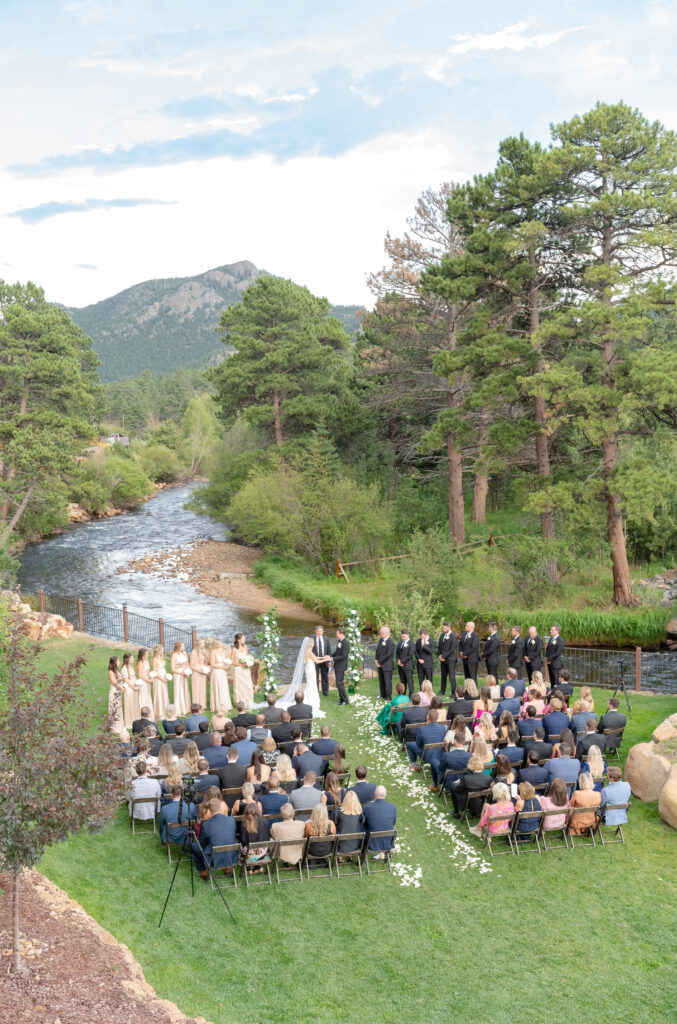 Aerial shot of riverside wedding at The Landing at Estes Park in Colorado