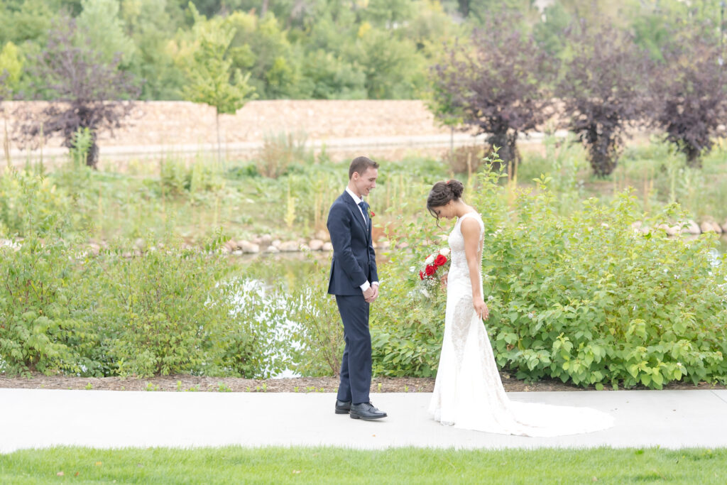 Bride and groom first look in a downtown Colorado Springs park