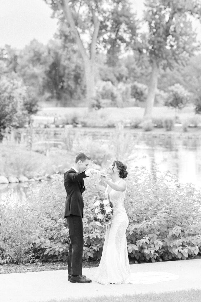 Emotional first look with pond and greenery in downtown Colorado Springs
