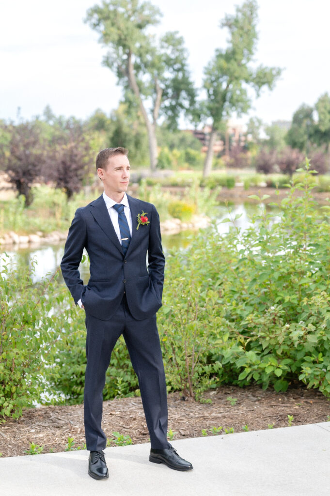 Portrait of the groom before his first look at The Pinery at The Hill wedding venue in Colorado 