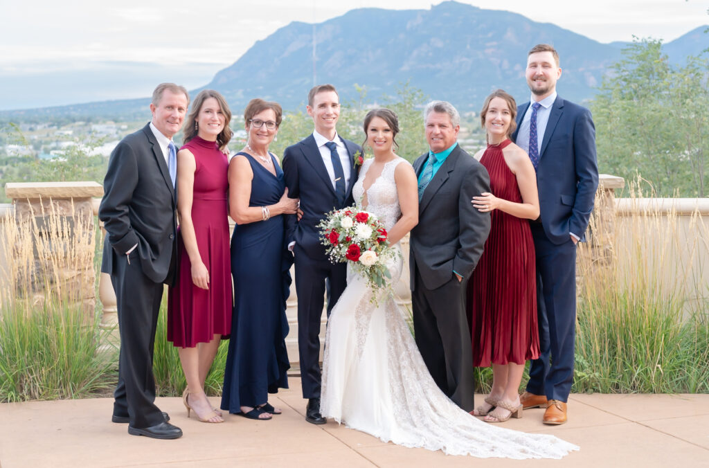 Bride and groom with family at The Pinery At The Hill
