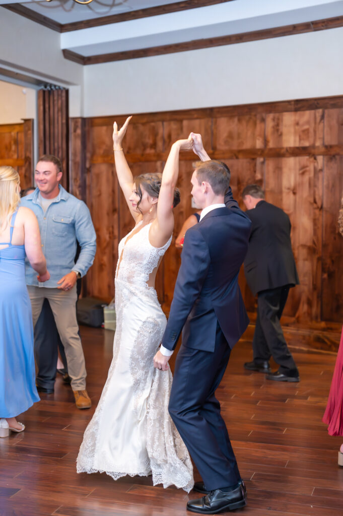 Bride and groom sharing their first dance at The Pinery At The Hill reception 
