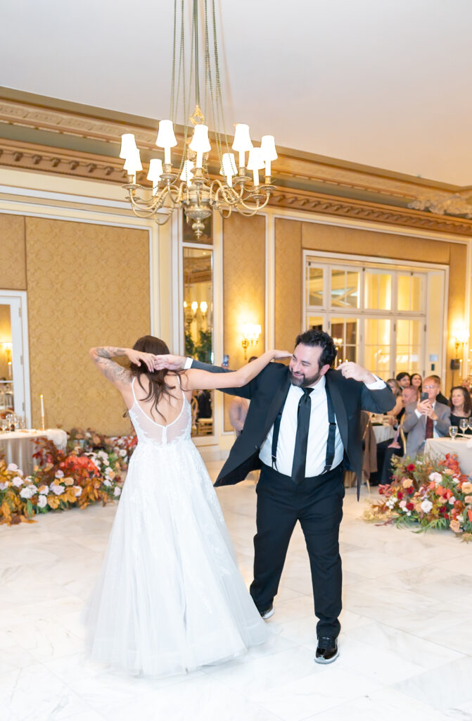 Bride and groom sharing their first dance as husband and wife on their winter wedding day, at The Broadmoor