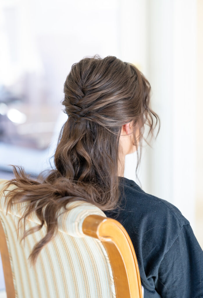 Picture of bride's back of hair while getting ready on her Colorado Springs winter wedding day at The Broadmoor
