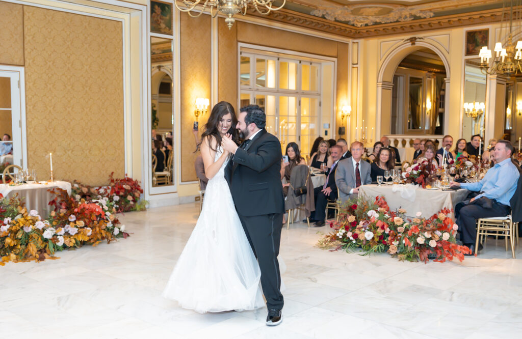 Bride and groom sharing their first dance as husband and wife on their winter wedding day, at The Broadmoor, in Colorado Springs 